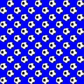 Half Inch Black and White Soccer Balls on Blue
