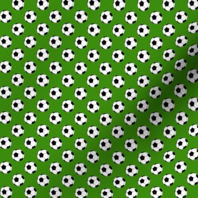 Half Inch Black and White Soccer Balls on Apple Green