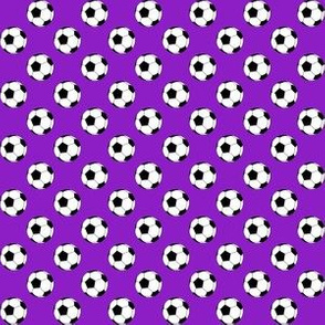 Half Inch Black and White Soccer Balls on Purple