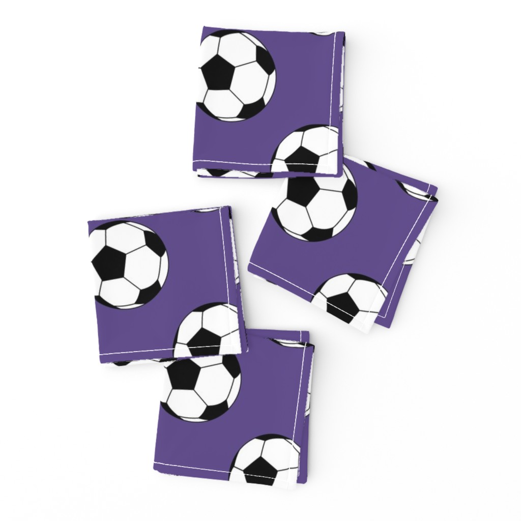 Three Inch Black and White Soccer Balls on Ultra Violet Purple