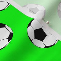 Two Inch Black and White Soccer Balls on Lime Green