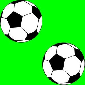 Three Inch Black and White Soccer Balls on Lime Green