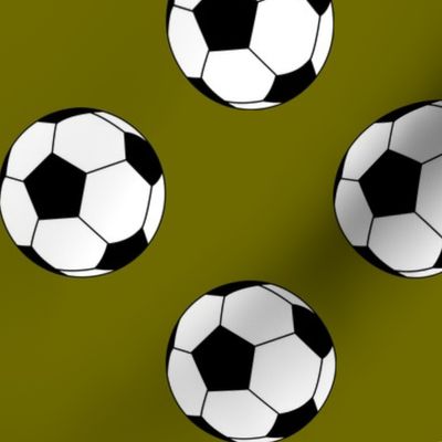 Three Inch Black and White Soccer Balls on Olive Green