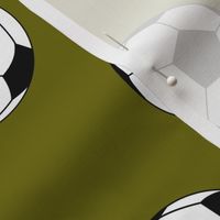 Three Inch Black and White Soccer Balls on Olive Green