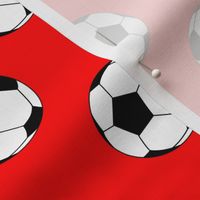 Two Inch Black and White Sports Soccer Balls on Red