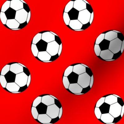 Two Inch Black and White Sports Soccer Balls on Red