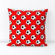 Two Inch Black and White Sports Soccer Balls on Red