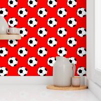 Three Inch Black and White Sports Soccer Balls on Red