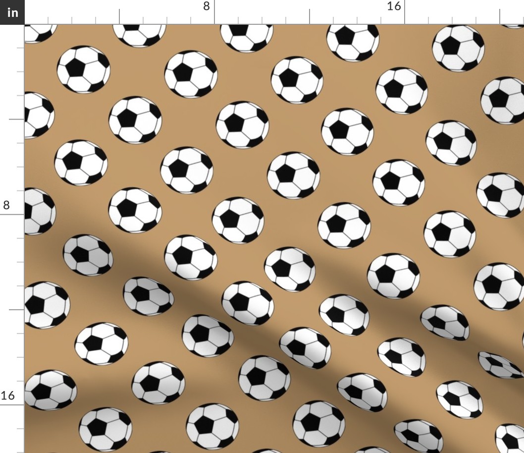 Two Inch Black and White Soccer Balls on Camel Brown