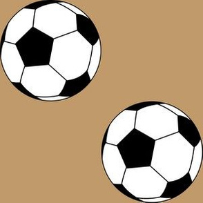 Three Inch Black and White Soccer Balls on Camel Brown