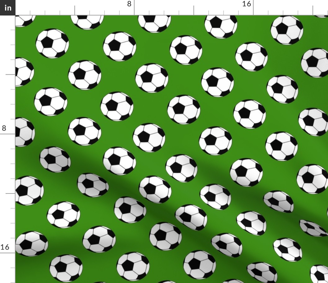Two Inch Black and White Sports Soccer Balls on Apple Green