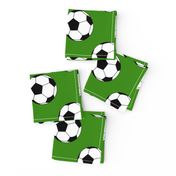 Three Inch Black and White Sports Soccer Balls on Apple Green