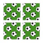 Three Inch Black and White Sports Soccer Balls on Apple Green