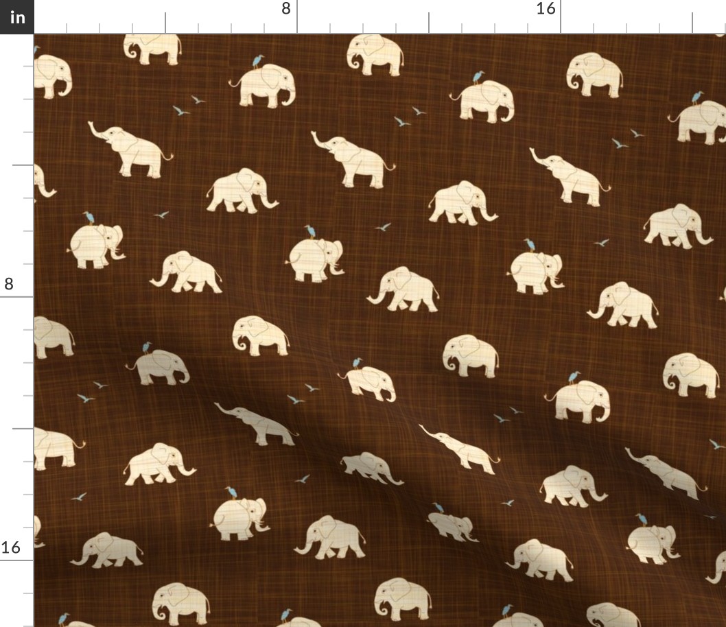 beige elephant on brown