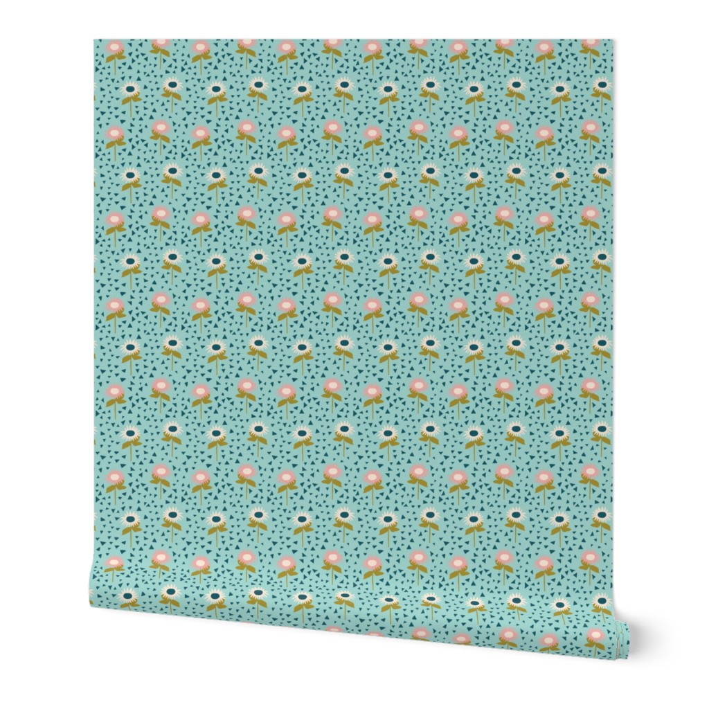 Row of flowers and triangles pattern on a mint green background