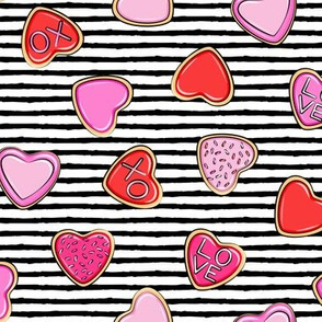 heart sugar cookies - valentines - pink and red on black stripe