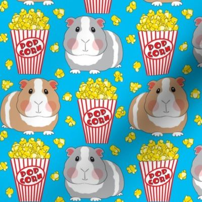 large guinea-pigs-with-popcorn on blue