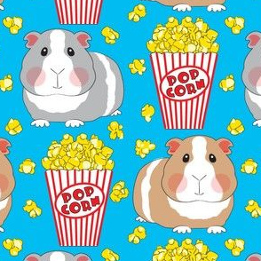 large guinea-pigs-with-popcorn on blue