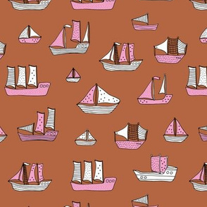Fishing sailing boats and pirate ships on the shore and at sea pink copper girls