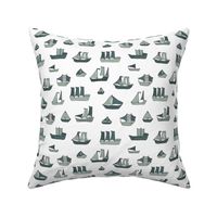 Fishing sailing boats and pirate ships on the shore and at sea dusty green