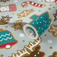 Christmas gingerbread cookies on mint gray