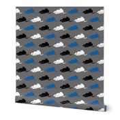 Blue Snowmobiles on Grey