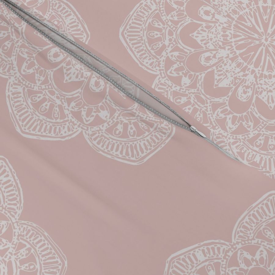 white medallion on blush pink