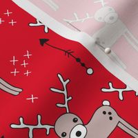 Adorable woodland reindeer and arrows christmas illustration kids pattern design in soft winter red