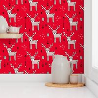 Adorable woodland reindeer and arrows christmas illustration kids pattern design in soft winter red
