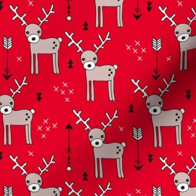 Adorable woodland reindeer and arrows christmas illustration kids pattern design in soft winter red