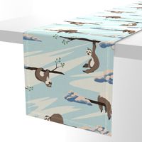 Cute sloths seamless pattern . Texture with cartoon animals and clouds on a blue sky background