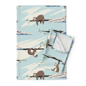 Cute sloths seamless pattern . Texture with cartoon animals and clouds on a blue sky background