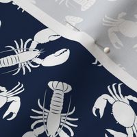 lobsters and crabs on navy