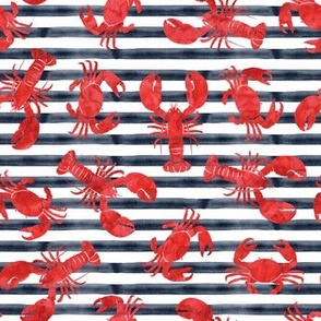 lobsters and crabs on navy stripes