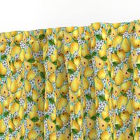 Yellow pears in flowers on a light green background