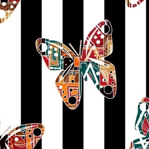 Multicolored paper cut out butterflies on black and white striped 