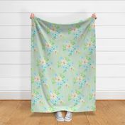 Tropical flowers on light green in loose watercolor. Use the design for a swimsuit or bikini, bathroom wallpaper or kitchen home décor.