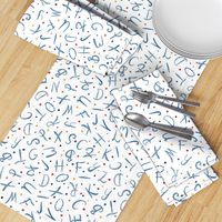 Blue hand-drawn alphabet letters with dots on white