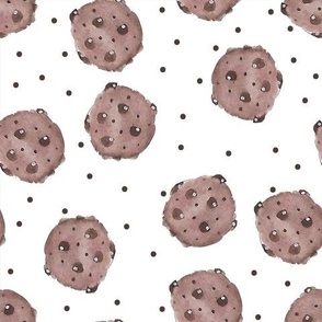 Chocolate chip cookies on white with dots