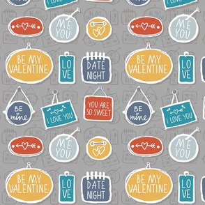 colorful love labels on gray