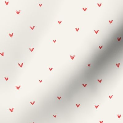 Hot red hearts on bone background