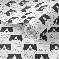 black and white cat faces with triangles