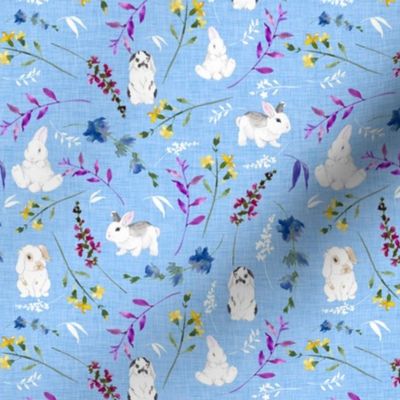 Watercolor Easter Bunnies on Blue Linen Texture Wild Flowers
