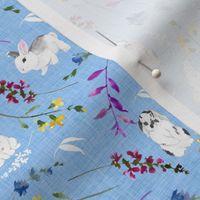 Watercolor Easter Bunnies on Blue Linen Texture Wild Flowers