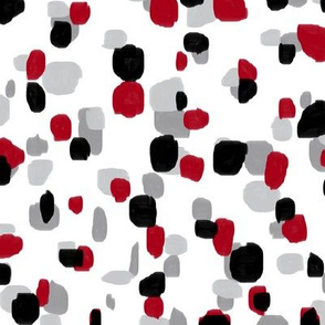 random spots in black, red, gray on white
