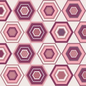 Striped pink hexagons on a cream background