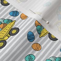 dump trucks with easter eggs - orange and blue on grey stripes - LAD19