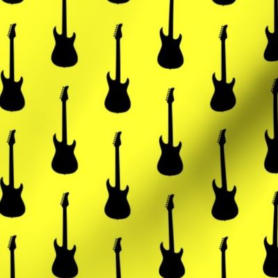 Large Black Electric Guitars on Yellow
