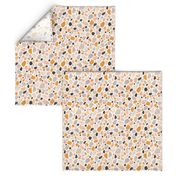 Terrazzo grey, orange and pink pebbles seamless pattern