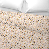 Terrazzo grey, orange and pink pebbles seamless pattern